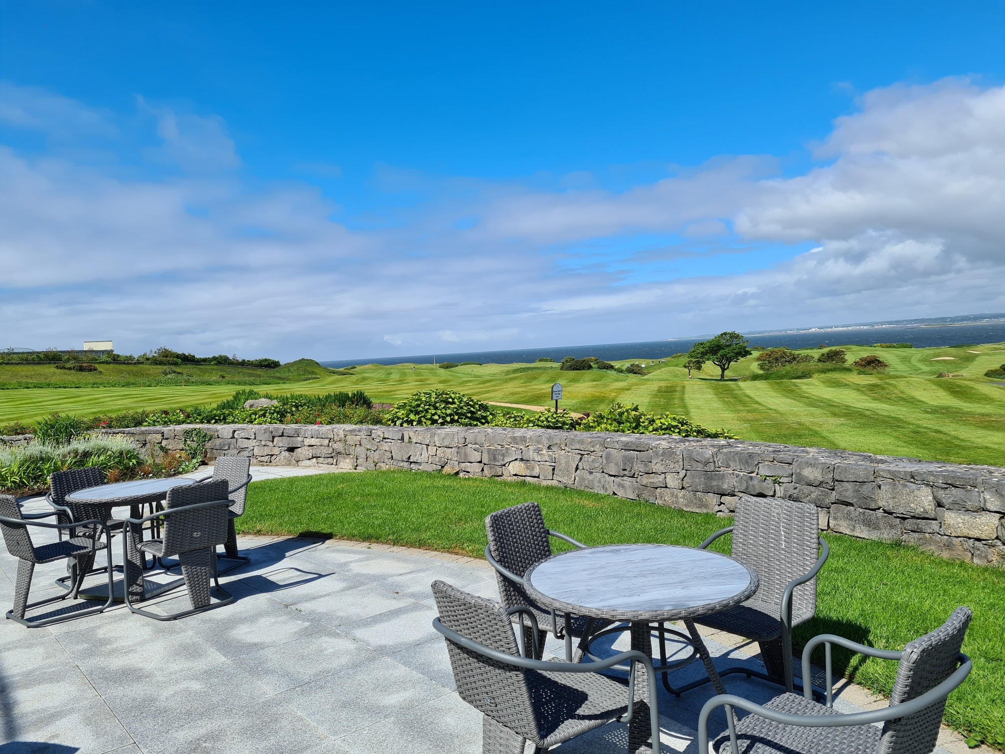 outdoor dining with view of galway bay golf resort